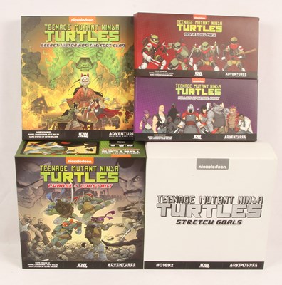 Lot 23 - IDW Games - Teenage Mutant Ninja Turtles Board Games & Accessory Upgrade Packs.