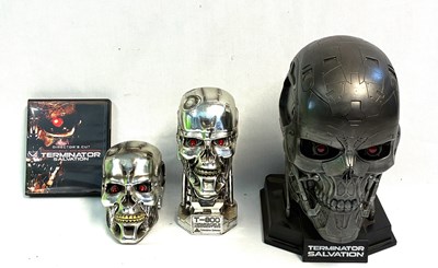 Lot 311 - Terminator Salvation Blu-Ray 1:1 scale T-800 set & T-800 Trinket Heads x 2