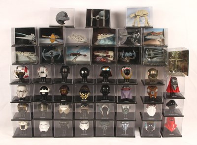 Lot 404 - Large Group of 47 x Diagostini Star Wars Helmets and Vehicles