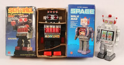 Lot 429 - SENTINEL & SPACE WALK MAN - Pair of Battery Operated Walking Robots.