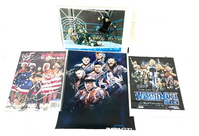 Lot 470 - Wrestling hand multi signed pictures and poster x 4