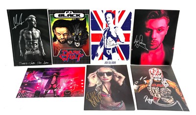 Lot 471 - Wrestling hand multi signed pictures x 7